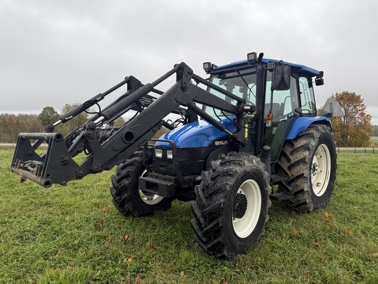 Traktors New Holland tl90 ar frontalo iekrāvēju 